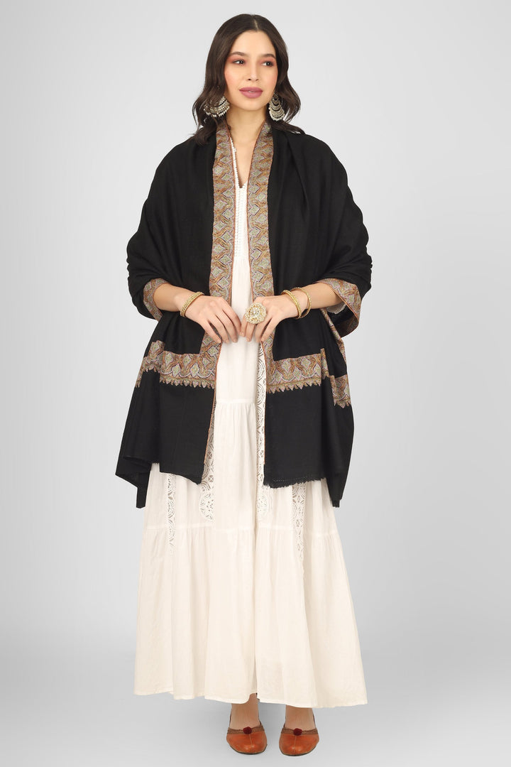 Authentic Kashmiri craftsmanship shines in the Black Maheen Pashmina Border Sozni Shawl. Made from natural pashmina wool, this luxurious piece features exquisite sozni embroidery along the borders, making it perfect for winter fashion or special occasions. Ideal as a wedding wrap or an elegant addition to your wardrobe, it’s one of the best pashmina shawls from Kashmir. Explore exclusive embroidered designs and buy pure pashmina shawls online today. Authentic Kashmiri craftsmanship shines in the Black Maheen Pashmina Border Sozni Shawl. Made from natural pashmina wool, this luxurious piece features exquisite sozni embroidery along the borders, making it perfect for winter fashion or special occasions. Ideal as a wedding wrap or an elegant addition to your wardrobe, it’s one of the best pashmina shawls from Kashmir. Explore exclusive embroidered designs and buy pure pashmina shawls online today.