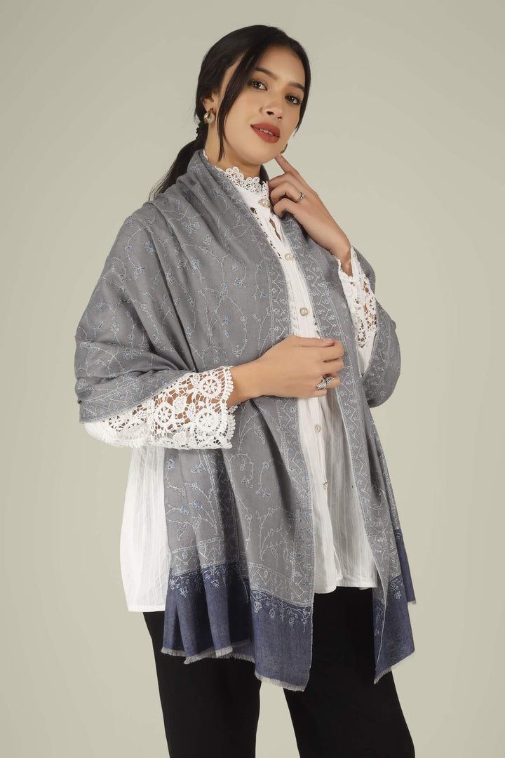 Hand-embroidered grey and navy-blue dual-tone pure Pashmina stole featuring an all-over sky-blue Jaldaar Sozni floral vine pattern from Kepra.
| pashmina shawls online | authentic Kashmiri pashmina shawl online | pure pashmina shawl online | original GI certified pashmina shawl online | luxury men's pashmina shawl online from Kashmir | where to buy online pure pashmina in India
| GI Tag Certified - Government-verified authentic Kashmiri Pashmina
| G20 Official Partner - Selected by India for G20 Summit gifting
| Handicraft Registered - Official recognition of traditional craftsmanship
| Certificate of Authenticity - Every purchase includes GI certification Hand-embroidered grey and navy-blue dual-tone pure Pashmina stole featuring an all-over sky-blue Jaldaar Sozni floral vine pattern from Kepra.
| pashmina shawls online | authentic Kashmiri pashmina shawl online | pure pashmina shawl online | original GI certified pashmina shawl online | luxury men's pashmina shawl online from Kashmir | where to buy online pure pashmina in India
| GI Tag Certified - Government-verified authentic Kashmiri Pashmina
| G20 Official Partner - Selected by India for G20 Summit gifting
| Handicraft Registered - Official recognition of traditional craftsmanship
| Certificate of Authenticity - Every purchase includes GI certification