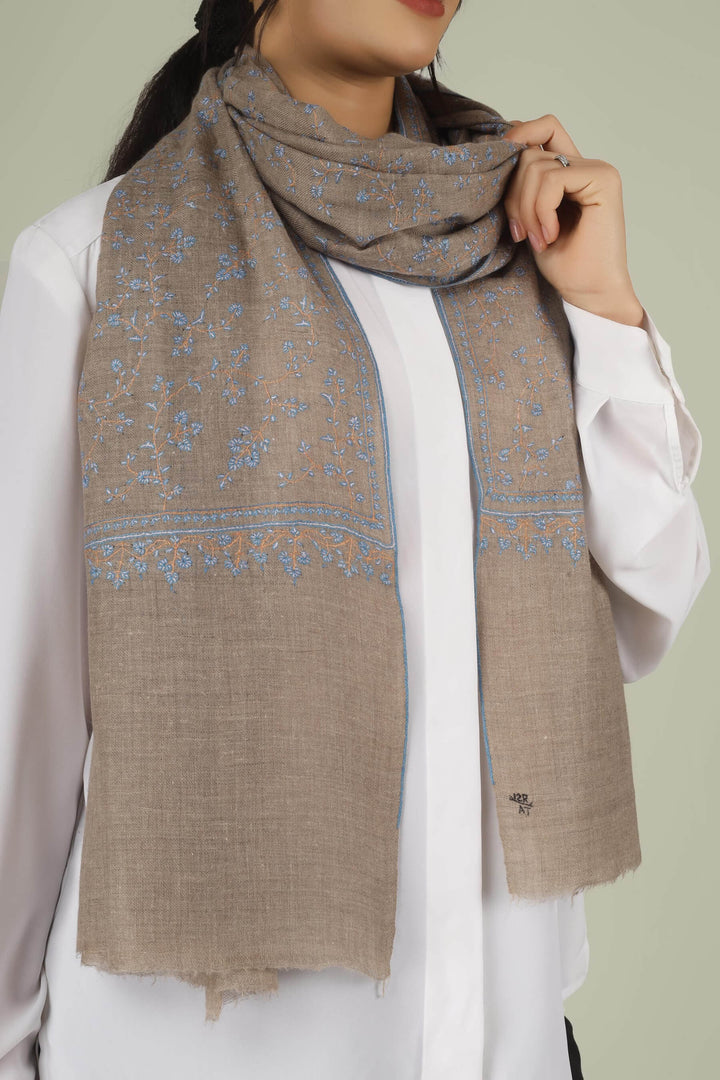 Hand-embroidered natural taupe pure Pashmina stole featuring an all-over sky-blue Sozni Jaldaar floral vine pattern from Kepra.
| pashmina shawls online | authentic Kashmiri pashmina shawl online | pure pashmina shawl online | original GI certified pashmina shawl online | luxury men's pashmina shawl online from Kashmir | where to buy online pure pashmina in India
| GI Tag Certified - Government-verified authentic Kashmiri Pashmina
| G20 Official Partner - Selected by India for G20 Summit gifting
| Handicraft Registered - Official recognition of traditional craftsmanship
| Certificate of Authenticity - Every purchase includes GI certification Hand-embroidered natural taupe pure Pashmina stole featuring an all-over sky-blue Sozni Jaldaar floral vine pattern from Kepra.
| pashmina shawls online | authentic Kashmiri pashmina shawl online | pure pashmina shawl online | original GI certified pashmina shawl online | luxury men's pashmina shawl online from Kashmir | where to buy online pure pashmina in India
| GI Tag Certified - Government-verified authentic Kashmiri Pashmina
| G20 Official Partner - Selected by India for G20 Summit gifting
| Handicraft Registered - Official recognition of traditional craftsmanship
| Certificate of Authenticity - Every purchase includes GI certification