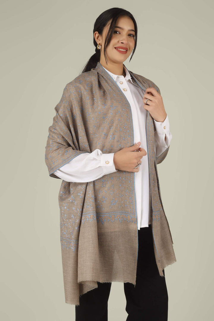 Hand-embroidered natural taupe pure Pashmina stole featuring an all-over sky-blue Sozni Jaldaar floral vine pattern from Kepra.
| pashmina shawls online | authentic Kashmiri pashmina shawl online | pure pashmina shawl online | original GI certified pashmina shawl online | luxury men's pashmina shawl online from Kashmir | where to buy online pure pashmina in India
| GI Tag Certified - Government-verified authentic Kashmiri Pashmina
| G20 Official Partner - Selected by India for G20 Summit gifting
| Handicraft Registered - Official recognition of traditional craftsmanship
| Certificate of Authenticity - Every purchase includes GI certification Hand-embroidered natural taupe pure Pashmina stole featuring an all-over sky-blue Sozni Jaldaar floral vine pattern from Kepra.
| pashmina shawls online | authentic Kashmiri pashmina shawl online | pure pashmina shawl online | original GI certified pashmina shawl online | luxury men's pashmina shawl online from Kashmir | where to buy online pure pashmina in India
| GI Tag Certified - Government-verified authentic Kashmiri Pashmina
| G20 Official Partner - Selected by India for G20 Summit gifting
| Handicraft Registered - Official recognition of traditional craftsmanship
| Certificate of Authenticity - Every purchase includes GI certification