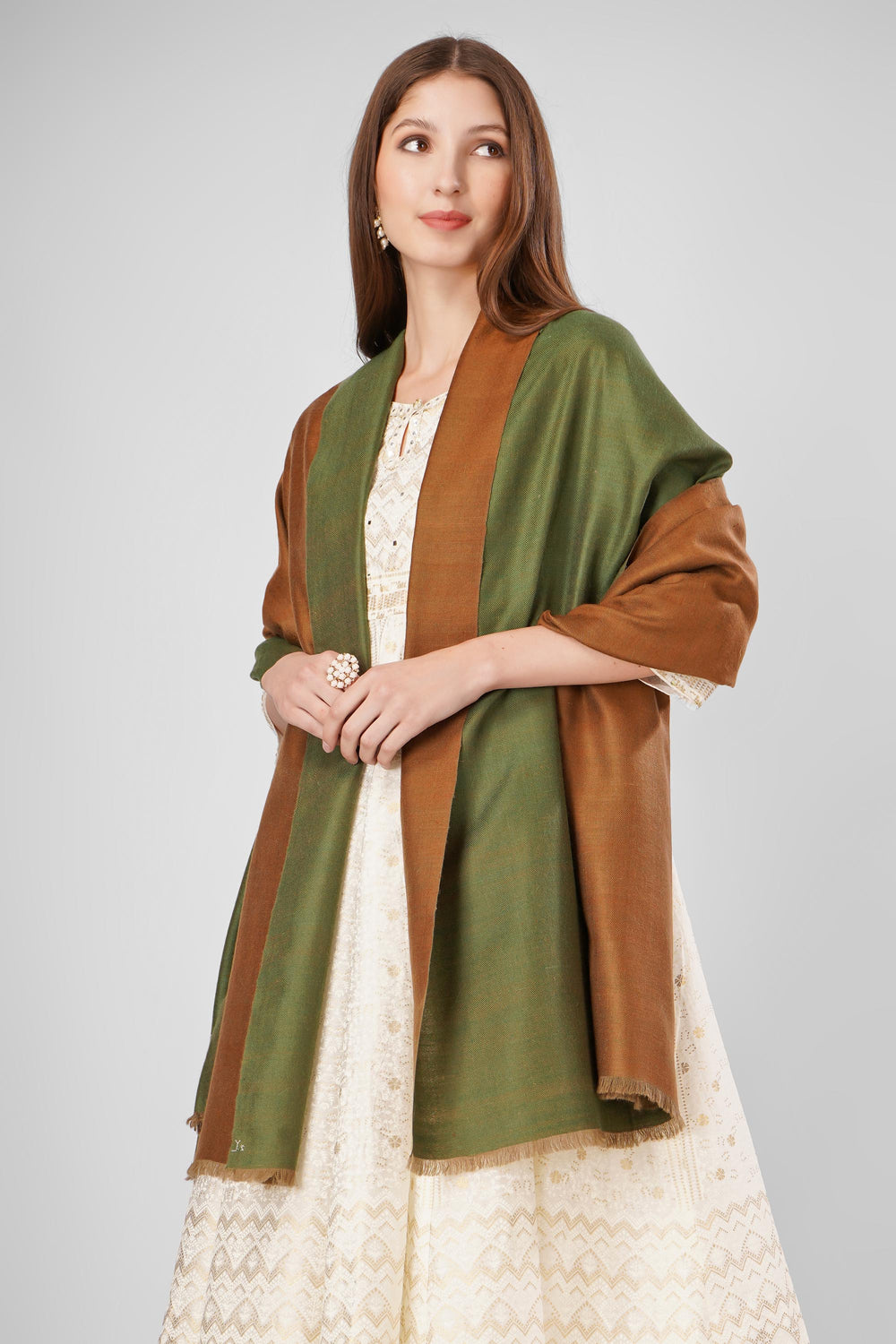 Brown and green reversible Kashmiri pashmina shawl draped over a mannequin, showing both color sides.