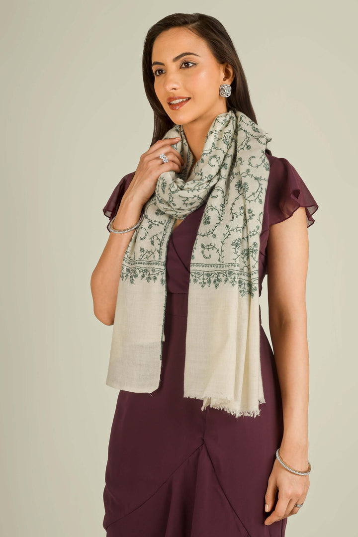 Ivory Kashmiri pure pashmina embroidered stole with green vine motifs by Kepra, wrapped around neck over plum dress, front detail view for Barcelona winter styling
| pashmina shawls online | authentic Kashmiri pashmina shawl online | pure pashmina shawl online | original GI certified pashmina shawl online | luxury men's pashmina shawl online from Kashmir | where to buy online pure pashmina in India
| GI Tag Certified - Government-verified authentic Kashmiri Pashmina
| G20 Official Partner - Selected by India for G20 Summit gifting
| Handicraft Registered - Official recognition of traditional craftsmanship
| Certificate of Authenticity - Every purchase includes GI certification Ivory Kashmiri pure pashmina embroidered stole with green vine motifs by Kepra, wrapped around neck over plum dress, front detail view for Barcelona winter styling
| pashmina shawls online | authentic Kashmiri pashmina shawl online | pure pashmina shawl online | original GI certified pashmina shawl online | luxury men's pashmina shawl online from Kashmir | where to buy online pure pashmina in India
| GI Tag Certified - Government-verified authentic Kashmiri Pashmina
| G20 Official Partner - Selected by India for G20 Summit gifting
| Handicraft Registered - Official recognition of traditional craftsmanship
| Certificate of Authenticity - Every purchase includes GI certification
