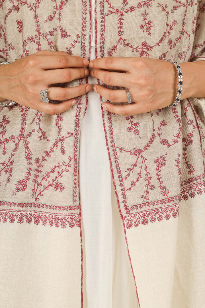 Close-up of beige Kashmiri pure pashmina stole with red sozni vine embroidery, held at the front, detail view for Berlin winter styling
| pashmina shawls online | authentic Kashmiri pashmina shawl online | pure pashmina shawl online | original GI certified pashmina shawl online | luxury men's pashmina shawl online from Kashmir | where to buy online pure pashmina in India
| GI Tag Certified - Government-verified authentic Kashmiri Pashmina
| G20 Official Partner - Selected by India for G20 Summit gifting
| Handicraft Registered - Official recognition of traditional craftsmanship
| Certificate of Authenticity - Every purchase includes GI certification Close-up of beige Kashmiri pure pashmina stole with red sozni vine embroidery, held at the front, detail view for Berlin winter styling
| pashmina shawls online | authentic Kashmiri pashmina shawl online | pure pashmina shawl online | original GI certified pashmina shawl online | luxury men's pashmina shawl online from Kashmir | where to buy online pure pashmina in India
| GI Tag Certified - Government-verified authentic Kashmiri Pashmina
| G20 Official Partner - Selected by India for G20 Summit gifting
| Handicraft Registered - Official recognition of traditional craftsmanship
| Certificate of Authenticity - Every purchase includes GI certification