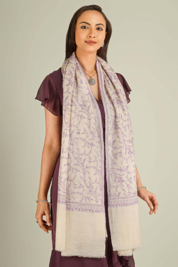 Ivory GI Kashmiri pure pashmina embroidered stole with lilac floral vines by Kepra, draped on model over plum dress, front view for Zurich winter styling
| pashmina shawls online | authentic Kashmiri pashmina shawl online | pure pashmina shawl online | original GI certified pashmina shawl online | luxury men's pashmina shawl online from Kashmir | where to buy online pure pashmina in India
| GI Tag Certified - Government-verified authentic Kashmiri Pashmina
| G20 Official Partner - Selected by India for G20 Summit gifting
| Handicraft Registered - Official recognition of traditional craftsmanship
| Certificate of Authenticity - Every purchase includes GI certification Ivory GI Kashmiri pure pashmina embroidered stole with lilac floral vines by Kepra, draped on model over plum dress, front view for Zurich winter styling
| pashmina shawls online | authentic Kashmiri pashmina shawl online | pure pashmina shawl online | original GI certified pashmina shawl online | luxury men's pashmina shawl online from Kashmir | where to buy online pure pashmina in India
| GI Tag Certified - Government-verified authentic Kashmiri Pashmina
| G20 Official Partner - Selected by India for G20 Summit gifting
| Handicraft Registered - Official recognition of traditional craftsmanship
| Certificate of Authenticity - Every purchase includes GI certification