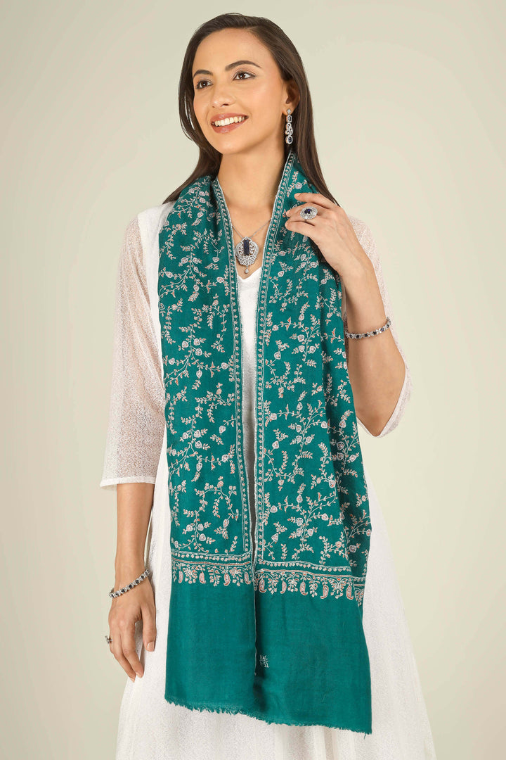 GI teal Kashmiri pure pashmina embroidered stole by Kepra, draped on smiling model in white dress, front view for Paris winter styling
| pashmina shawls online | authentic Kashmiri pashmina shawl online | pure pashmina shawl online | original GI certified pashmina shawl online | luxury men's pashmina shawl online from Kashmir | where to buy online pure pashmina in India
| GI Tag Certified - Government-verified authentic Kashmiri Pashmina
| G20 Official Partner - Selected by India for G20 Summit gifting
| Handicraft Registered - Official recognition of traditional craftsmanship
| Certificate of Authenticity - Every purchase includes GI certification GI teal Kashmiri pure pashmina embroidered stole by Kepra, draped on smiling model in white dress, front view for Paris winter styling
| pashmina shawls online | authentic Kashmiri pashmina shawl online | pure pashmina shawl online | original GI certified pashmina shawl online | luxury men's pashmina shawl online from Kashmir | where to buy online pure pashmina in India
| GI Tag Certified - Government-verified authentic Kashmiri Pashmina
| G20 Official Partner - Selected by India for G20 Summit gifting
| Handicraft Registered - Official recognition of traditional craftsmanship
| Certificate of Authenticity - Every purchase includes GI certification
