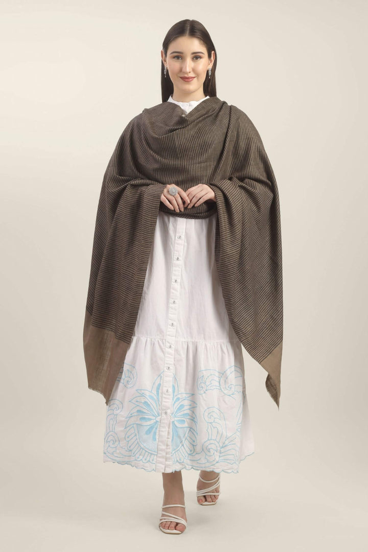 Model holding a taupe Pure Kashmiri Pashmina shawl with fine black woven stripes and a wide plain border over a white embroidered dress.
| pashmina shawls online | authentic Kashmiri pashmina shawl online | pure pashmina shawl online | original GI certified pashmina shawl online | luxury men's pashmina shawl online from Kashmir | where to buy online pure pashmina in India
| GI Tag Certified - Government-verified authentic Kashmiri Pashmina
| G20 Official Partner - Selected by India for G20 Summit gifting
| Handicraft Registered - Official recognition of traditional craftsmanship
| Certificate of Authenticity - Every purchase includes GI certification Model holding a taupe Pure Kashmiri Pashmina shawl with fine black woven stripes and a wide plain border over a white embroidered dress.
| pashmina shawls online | authentic Kashmiri pashmina shawl online | pure pashmina shawl online | original GI certified pashmina shawl online | luxury men's pashmina shawl online from Kashmir | where to buy online pure pashmina in India
| GI Tag Certified - Government-verified authentic Kashmiri Pashmina
| G20 Official Partner - Selected by India for G20 Summit gifting
| Handicraft Registered - Official recognition of traditional craftsmanship
| Certificate of Authenticity - Every purchase includes GI certification