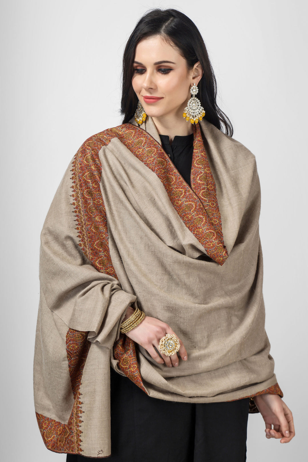 Elevate your fashion game with our exquisite collection of handmade Kashmiri pashmina shawls. Made from natural pashmina wool, our shawls feature stunning designs and intricate embroidery that are sure to turn heads. Indulge in the ultimate luxury and comfort with our premium quality pashmina wool shawls,