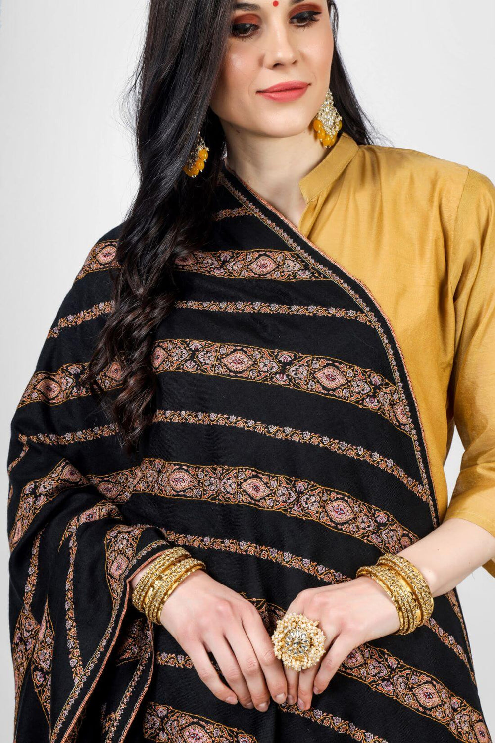 Pashmina Shawl is beautified with intricacies of Sozni; beautiful in all its forms in lovely Sozni columns known as khatraas&
