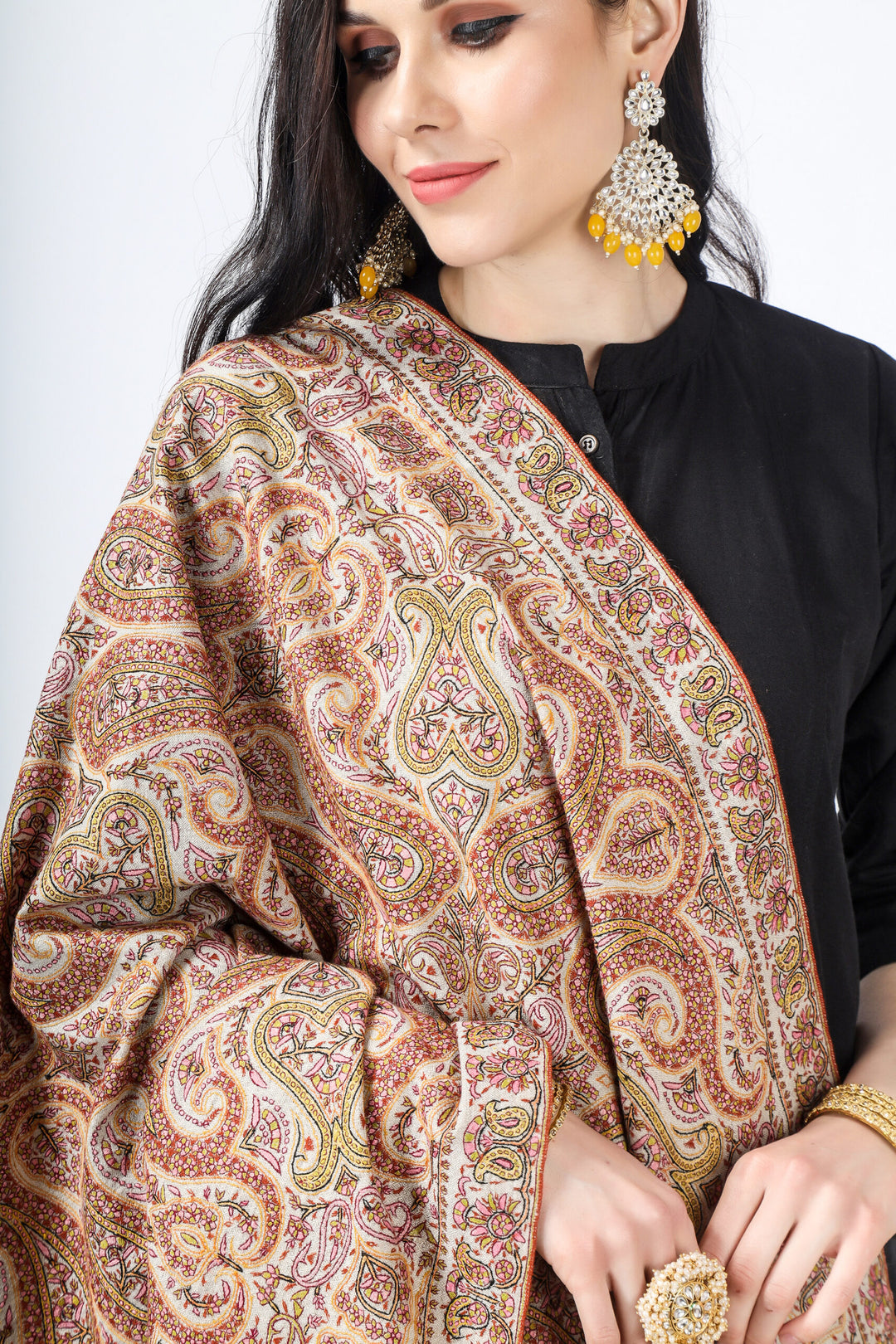 A beautiful Natural Pashmina color is featured by intricate Sozni across its surface called the Jamawaar pattern (jama shawl)giving it a contemporary edge.