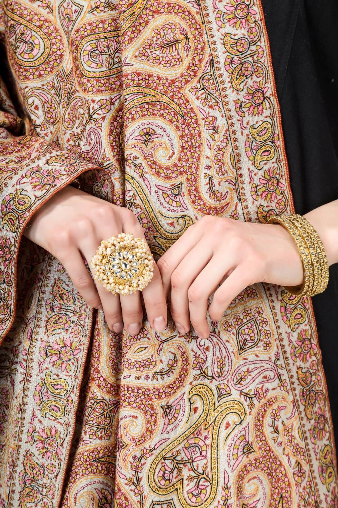 A beautiful Natural Pashmina color is featured by intricate Sozni across its surface called the Jamawaar pattern (jama shawl)giving it a contemporary edge.