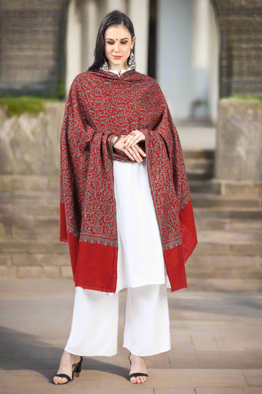 The Maroon Jaldaar Sozni Embroidered Pashmina Shawl is a stunning accessory made from high-quality pashmina wool.
