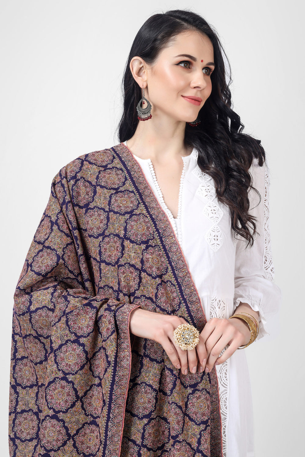 A Royal Blue Pashmina Sozni Jama Reshimkar Shawl is a luxurious handwoven shawl made from high-quality Pashmina fabric