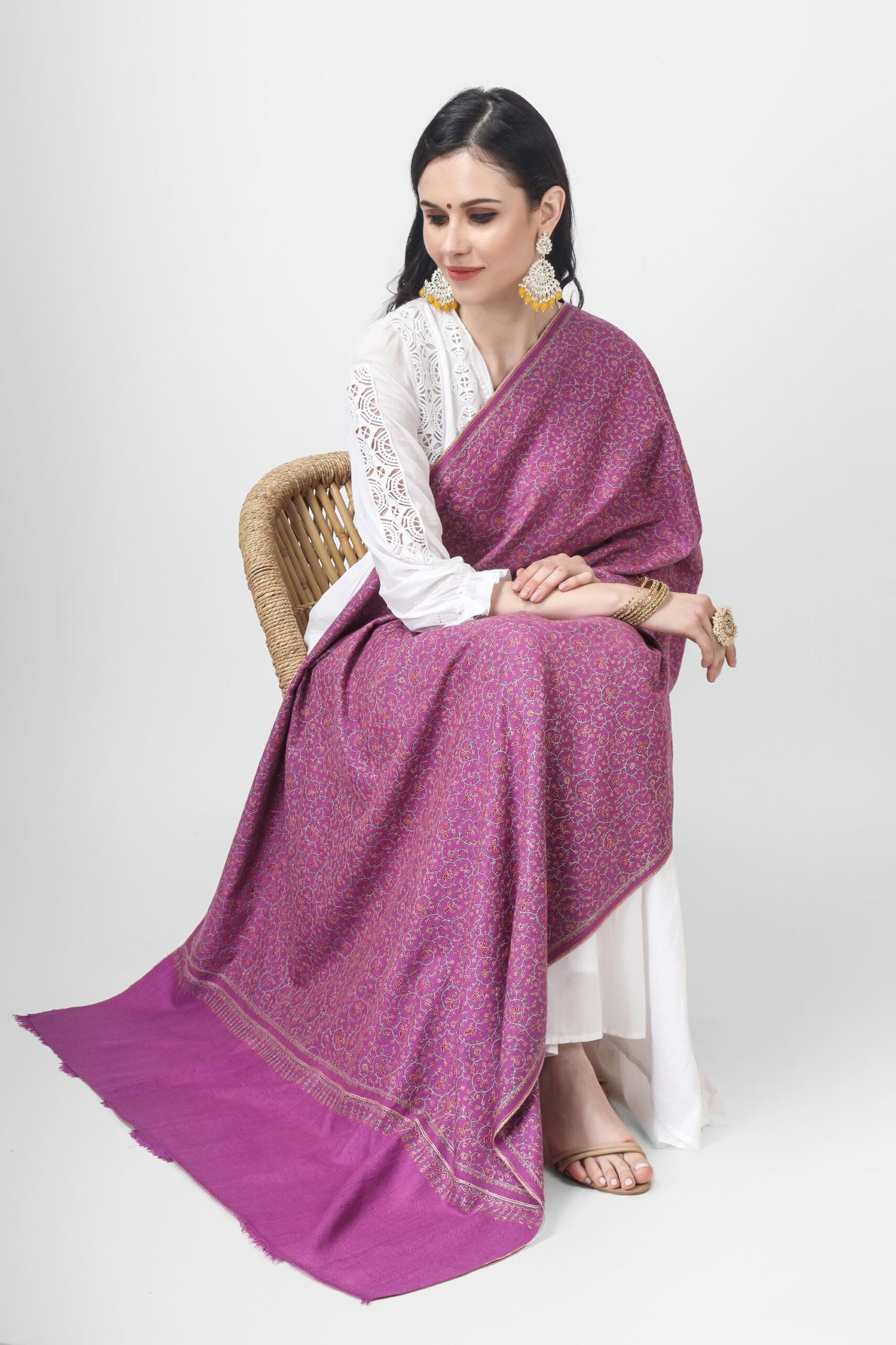 KUWAIT - This elegant White Pashmina Jaldaar With Fuchsia pink needlepoint Embroidered Shawl is decorated with deft needlework embroidery in a gorgeous Jaldaar pattern, making it a sumptuous and fashionable addition to any event.