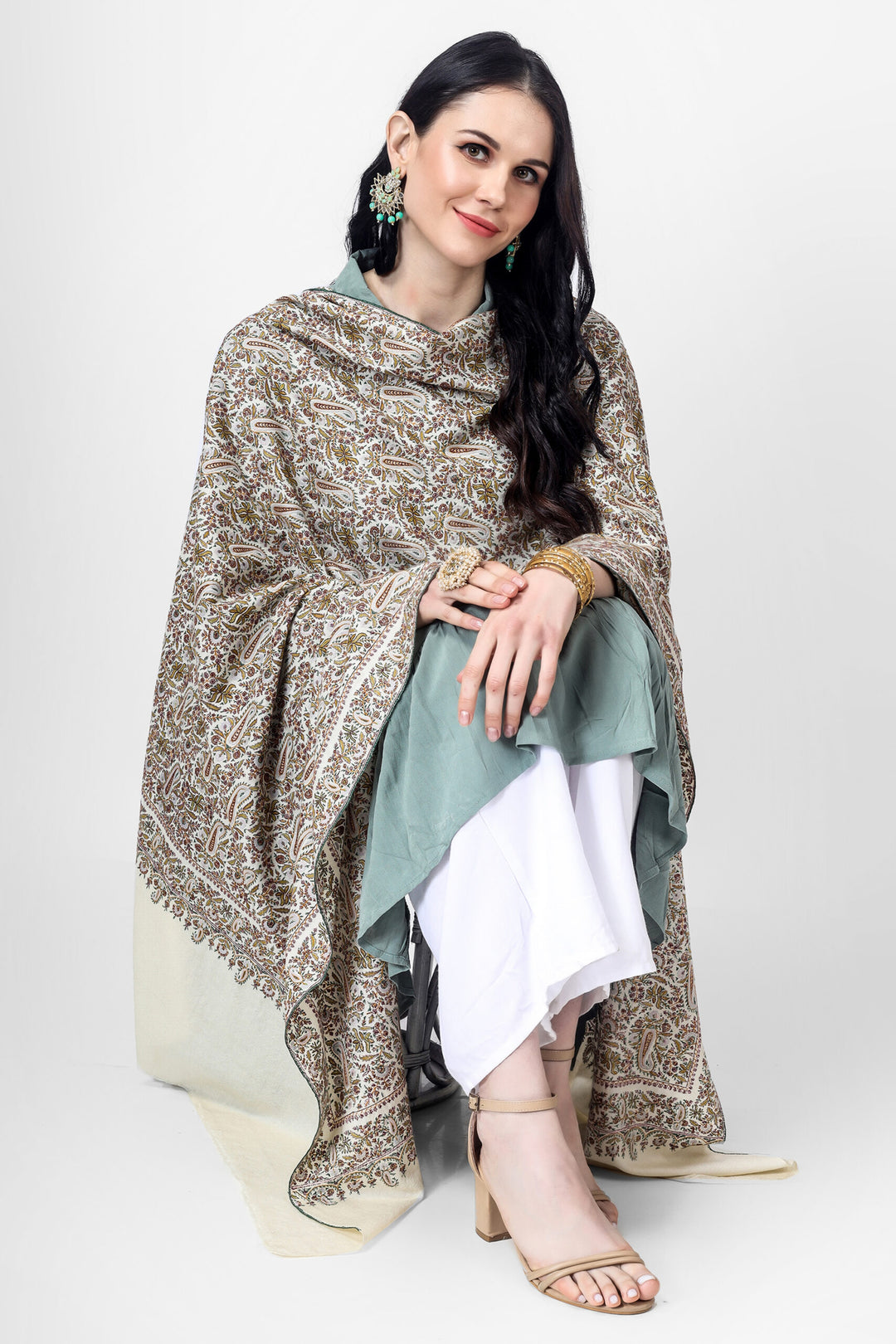 This White JAMA shawl is that iconic fashion accessory that can instantly communicate to the world the passion and exquisite tastes of its owner.