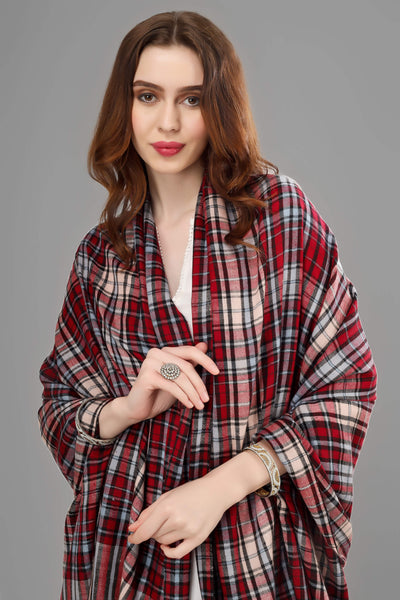 A check pashmina shawl is a classic accessory that adds sophistication and style to any outfit. The subtle check pattern on the shawl adds a touch of texture.
