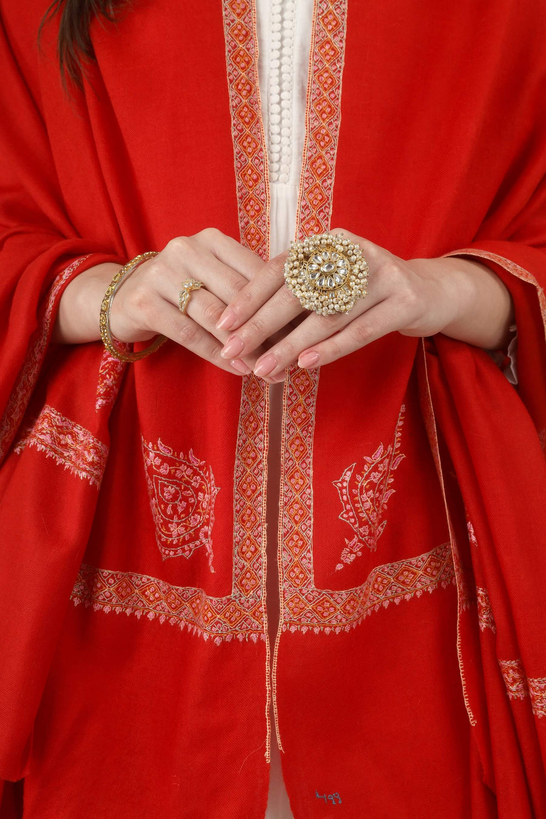 The saturated red tone is beautifully softened by the pink and cream embroidery, creating a look that is festive, graceful and timeless. It pairs effortlessly with white, ivory, cream, black, gold, beige and soft pastel outfits.