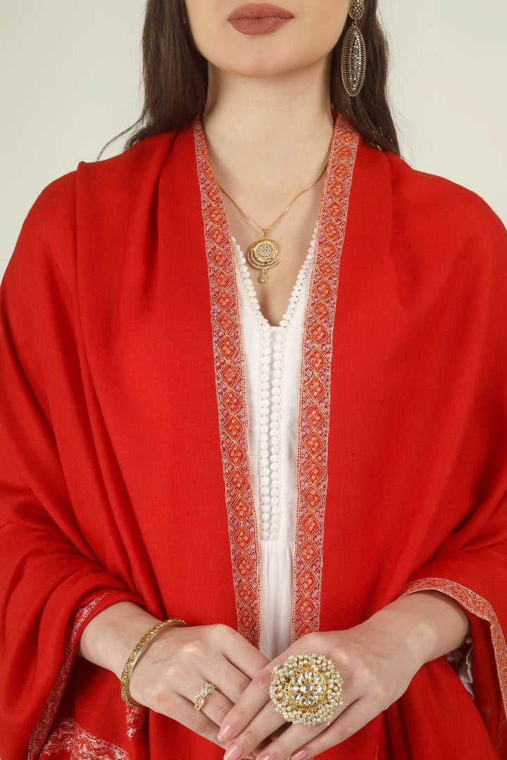 The saturated red tone is beautifully softened by the pink and cream embroidery, creating a look that is festive, graceful and timeless. It pairs effortlessly with white, ivory, cream, black, gold, beige and soft pastel outfits.
    
      | pashmina shawls online | authentic Kashmiri pashmina shawl online | pure pashmina shawl online | original GI certified pashmina shawl online | luxury men's pashmina shawl online from Kashmir | where to buy online pure pashmina in India
    
    | GI Tag Certified - Government-verified authentic Kashmiri Pashmina
    | G20 Official Partner - Selected by India for G20 Summit gifting
    | Handicraft Registered - Official recognition of traditional craftsmanship
    | Certificate of Authenticity - Every purchase includes GI certification