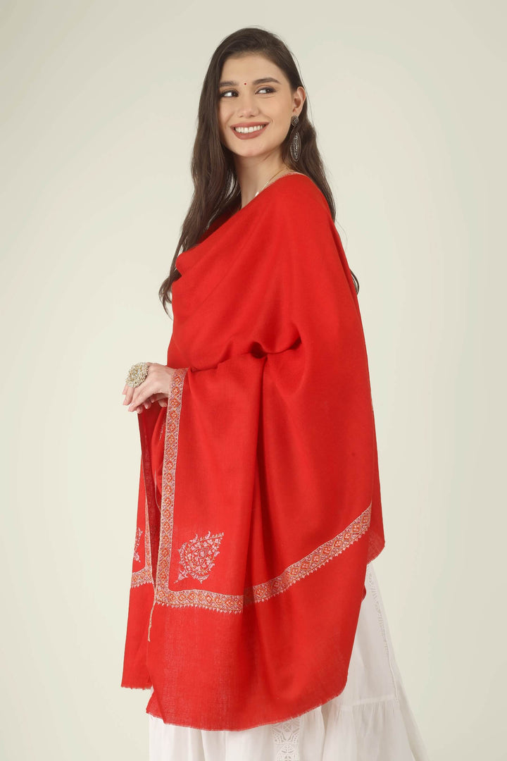 The saturated red tone is beautifully softened by the pink and cream embroidery, creating a look that is festive, graceful and timeless. It pairs effortlessly with white, ivory, cream, black, gold, beige and soft pastel outfits.
    
      | pashmina shawls online | authentic Kashmiri pashmina shawl online | pure pashmina shawl online | original GI certified pashmina shawl online | luxury men's pashmina shawl online from Kashmir | where to buy online pure pashmina in India
    
    | GI Tag Certified - Government-verified authentic Kashmiri Pashmina
    | G20 Official Partner - Selected by India for G20 Summit gifting
    | Handicraft Registered - Official recognition of traditional craftsmanship
    | Certificate of Authenticity - Every purchase includes GI certification