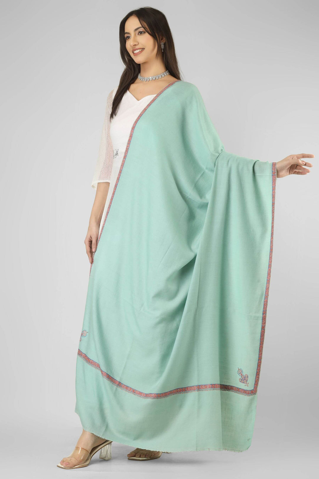 A perfect pick for admirers of pashmina shawls in Singapore, this mint green GI pashmina shawl brings export-quality Kashmiri craftsmanship