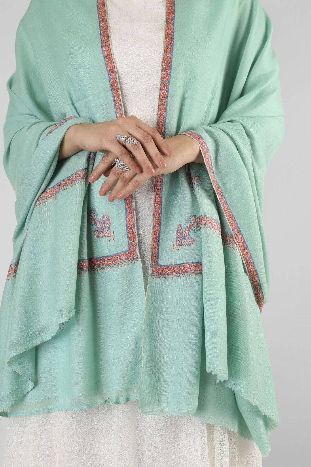A perfect pick for admirers of pashmina shawls in Singapore, this mint green GI pashmina shawl brings export-quality Kashmiri craftsmanship