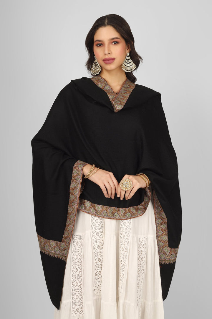 Authentic Kashmiri craftsmanship shines in the Black Maheen Pashmina Border Sozni Shawl. Made from natural pashmina wool, this luxurious piece features exquisite sozni embroidery along the borders, making it perfect for winter fashion or special occasions. Ideal as a wedding wrap or an elegant addition to your wardrobe, it’s one of the best pashmina shawls from Kashmir. Explore exclusive embroidered designs and buy pure pashmina shawls online today.