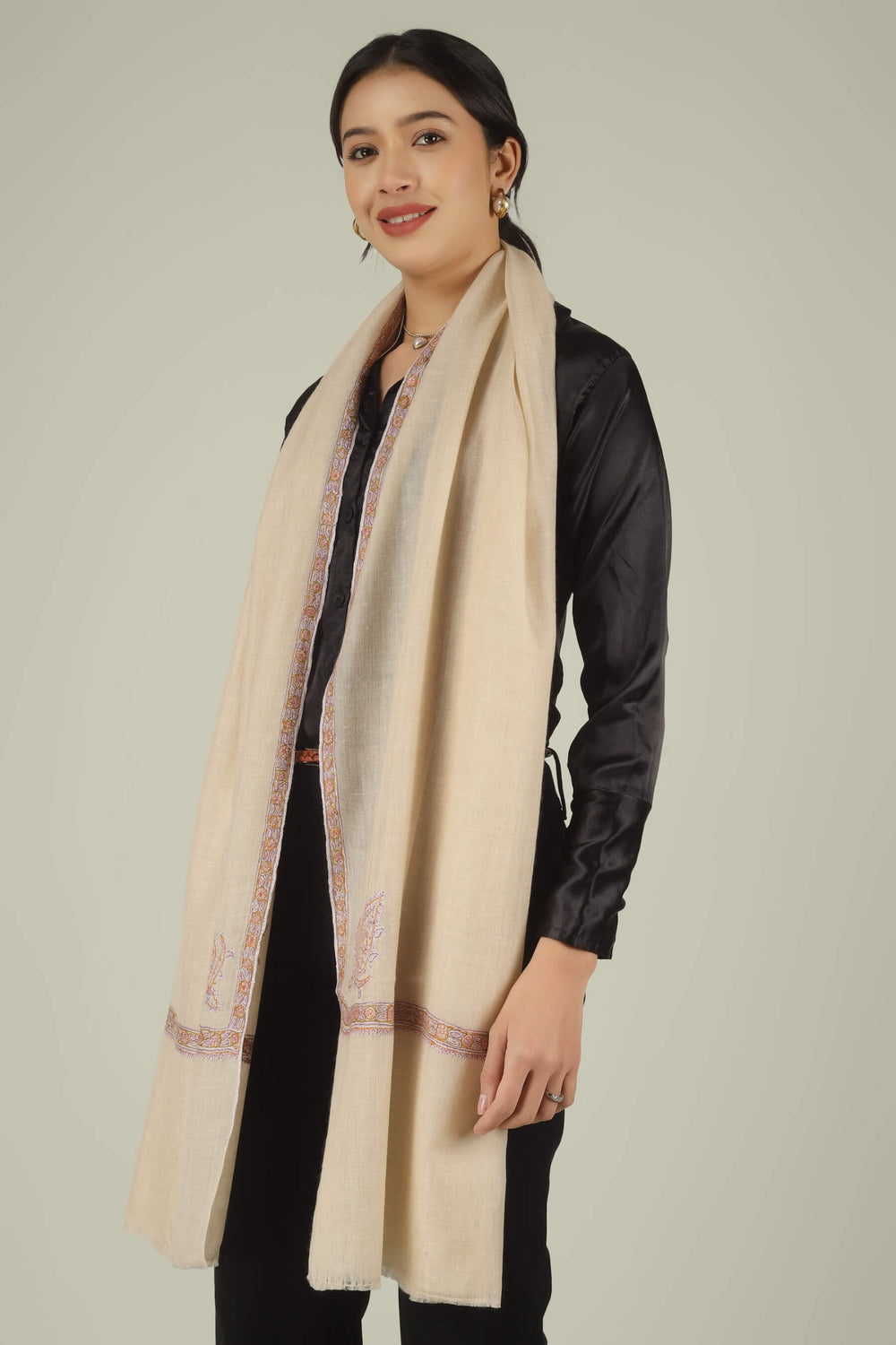 Hand-embroidered natural cream pure Pashmina stole featuring lavender and gold Sozni corner paisley (Buta) motifs and a delicate Hashidaar border from Kepra.