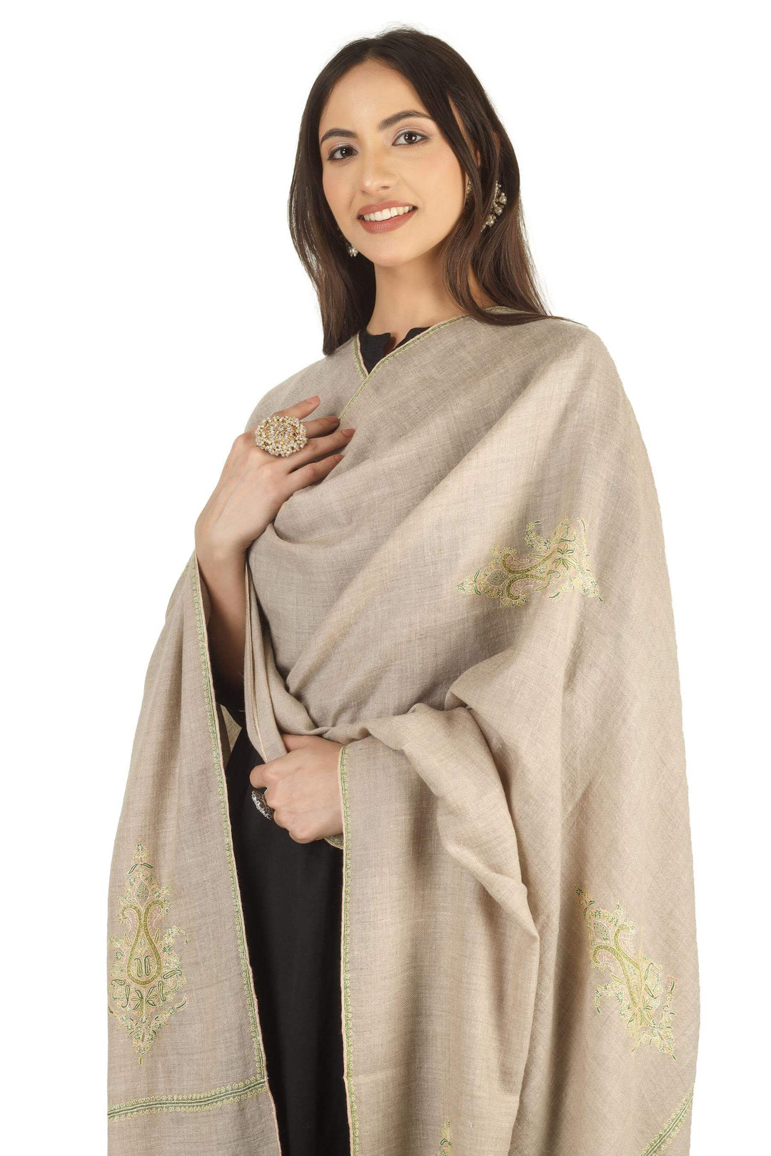 100% pure Kashmiri Pashmina wool for exceptional softness and warmth
Handcrafted Sozni Kaari embroidery on borders with pastel motifs
Earthy taupe brown base with delicate design details