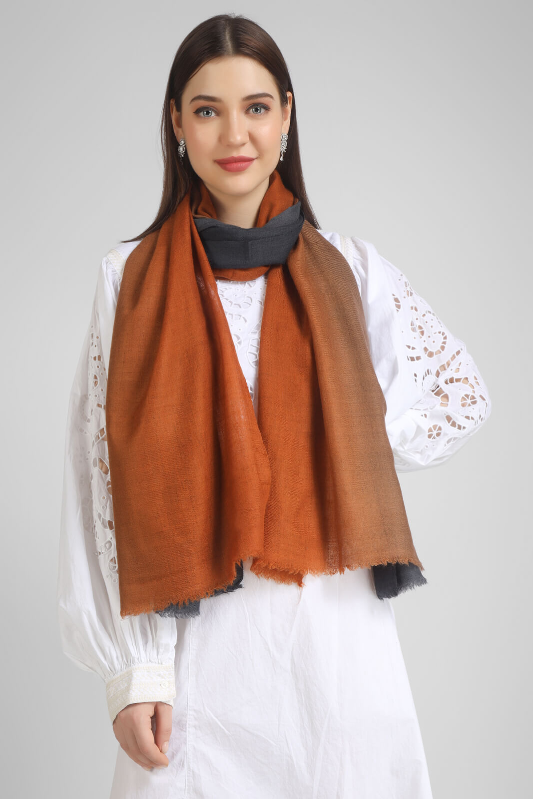 pashmina stoles Rust & Grey Ombre Pashmina Stole – a fusion of warm tones and cool grays.- We deliver our premium Pashmina products to the United Kingdom, Germany, France, Japan, UAE, and Australia. Elevate your style with ease – order now!"