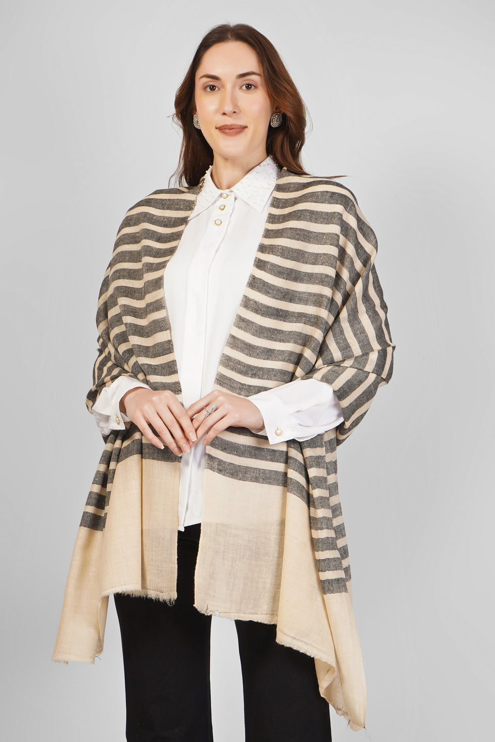 Beige and Grey Striped Pashmina Stoles Online – Contemporary Simplicity
Refine your style with this Beige and Grey Striped Designer Pashmina Stole, handwoven in Kashmir using the softest pure pashmina wool.