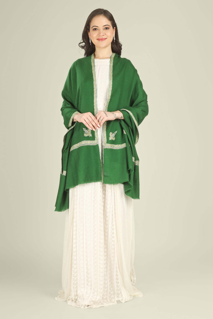 A woman modeling a green shawl with silver embroidered borders over a white traditional dress against a light beige studio background.
    
      | pashmina shawls online | authentic Kashmiri pashmina shawl online | pure pashmina shawl online | original GI certified pashmina shawl online | luxury men's pashmina shawl online from Kashmir | where to buy online pure pashmina in India
    
    | GI Tag Certified - Government-verified authentic Kashmiri Pashmina
    | G20 Official Partner - Selected by India for G20 Summit gifting
    | Handicraft Registered - Official recognition of traditional craftsmanship
    | Certificate of Authenticity - Every purchase includes GI certification