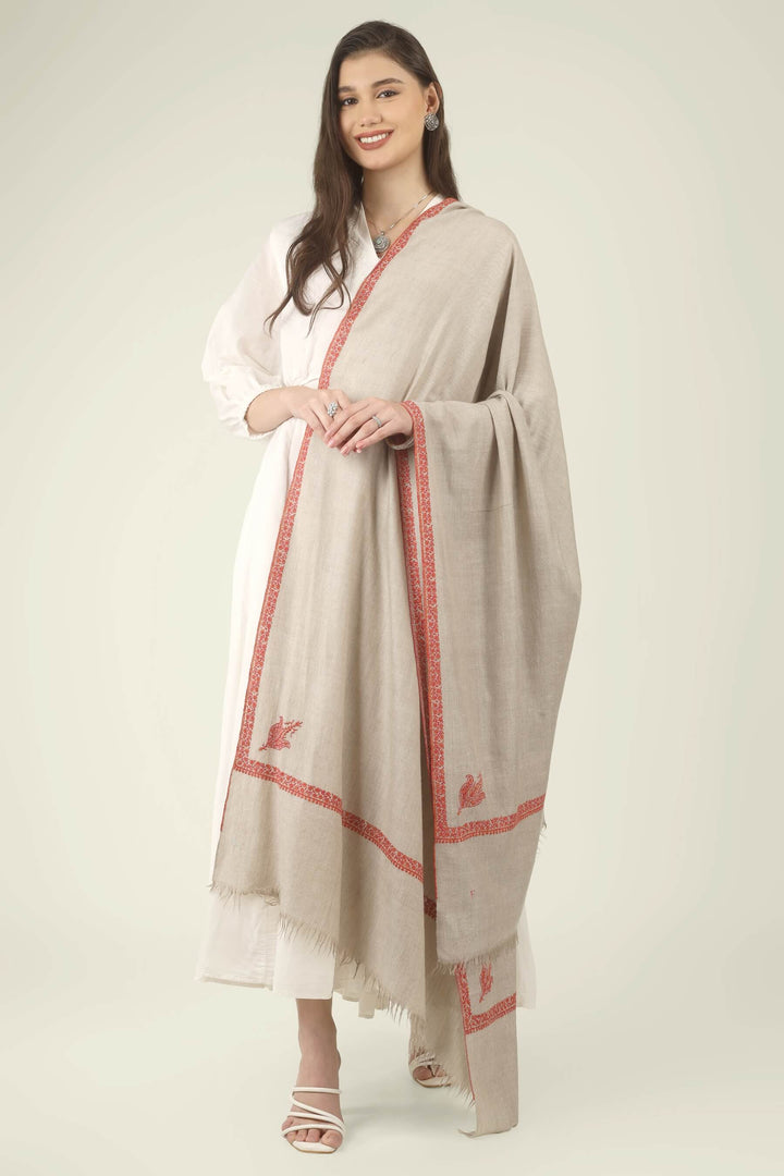 This Natural Khudrang GI Kashmiri Pure Pashmina Hashidaar Embroidered Shawl features a soft, undyed oatmeal-beige body framed by richly worked borders and paisley motifs in vivid red and warm orange
    
      | pashmina shawls online | authentic Kashmiri pashmina shawl online | pure pashmina shawl online | original GI certified pashmina shawl online | luxury men's pashmina shawl online from Kashmir | where to buy online pure pashmina in India
    
    | GI Tag Certified - Government-verified authentic Kashmiri Pashmina
    | G20 Official Partner - Selected by India for G20 Summit gifting
    | Handicraft Registered - Official recognition of traditional craftsmanship
    | Certificate of Authenticity - Every purchase includes GI certification