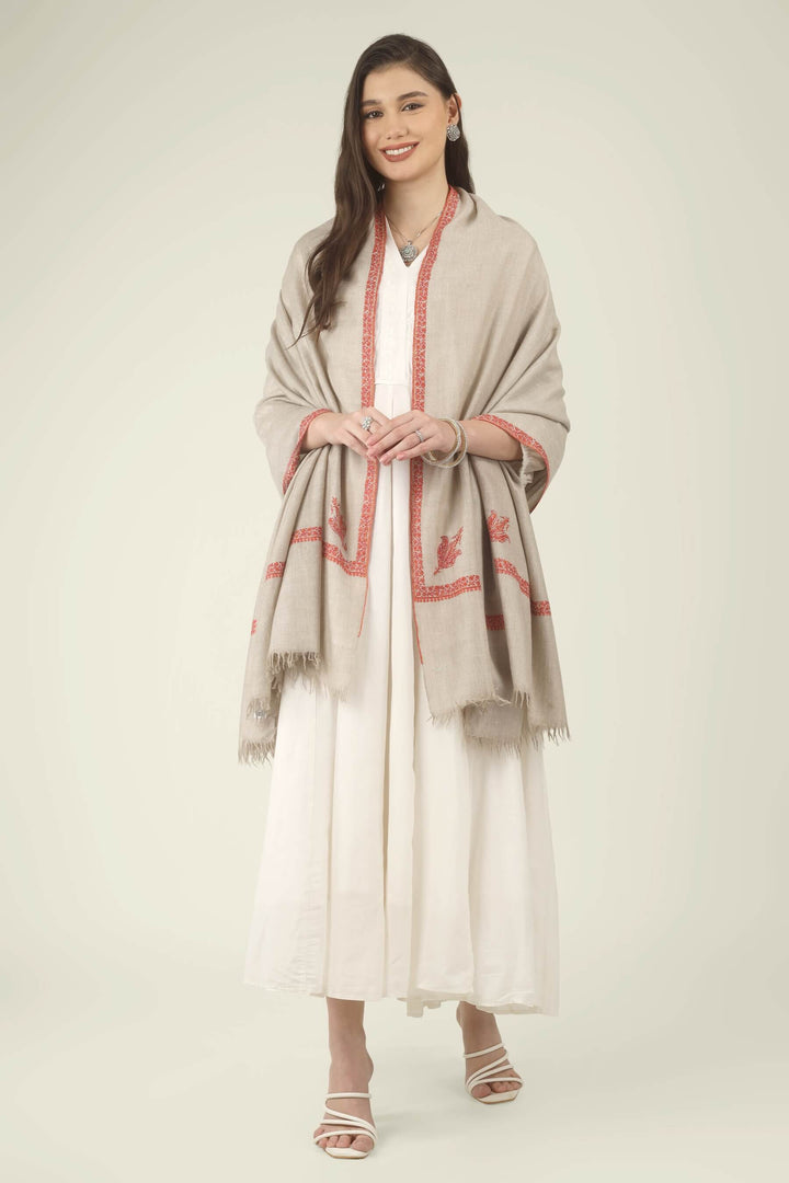 This Natural Khudrang GI Kashmiri Pure Pashmina Hashidaar Embroidered Shawl features a soft, undyed oatmeal-beige body framed by richly worked borders and paisley motifs in vivid red and warm orange
    
      | pashmina shawls online | authentic Kashmiri pashmina shawl online | pure pashmina shawl online | original GI certified pashmina shawl online | luxury men's pashmina shawl online from Kashmir | where to buy online pure pashmina in India
    
    | GI Tag Certified - Government-verified authentic Kashmiri Pashmina
    | G20 Official Partner - Selected by India for G20 Summit gifting
    | Handicraft Registered - Official recognition of traditional craftsmanship
    | Certificate of Authenticity - Every purchase includes GI certification