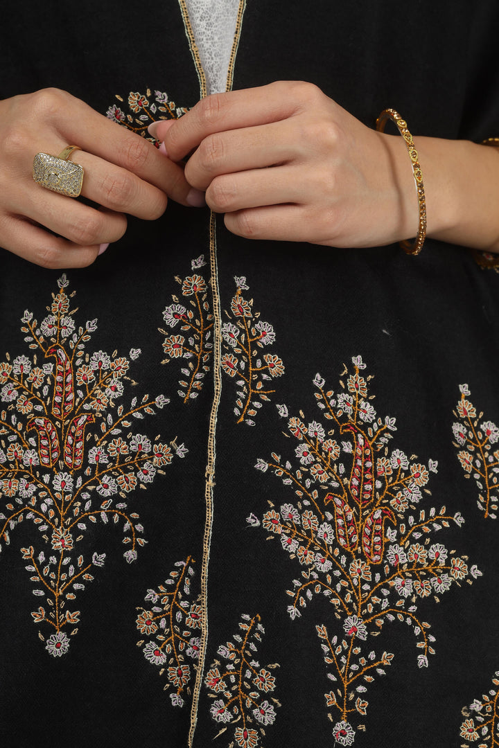 Model wearing a black GI Kashmiri Pure Pashmina stole with delicate multicolour floral Sozni embroidery over a white dress.
    
      | pashmina shawls online | authentic Kashmiri pashmina shawl online | pure pashmina shawl online | original GI certified pashmina shawl online | luxury men's pashmina shawl online from Kashmir | where to buy online pure pashmina in India
    
    | GI Tag Certified - Government-verified authentic Kashmiri Pashmina
    | G20 Official Partner - Selected by India for G20 Summit gifting
    | Handicraft Registered - Official recognition of traditional craftsmanship
    | Certificate of Authenticity - Every purchase includes GI certification