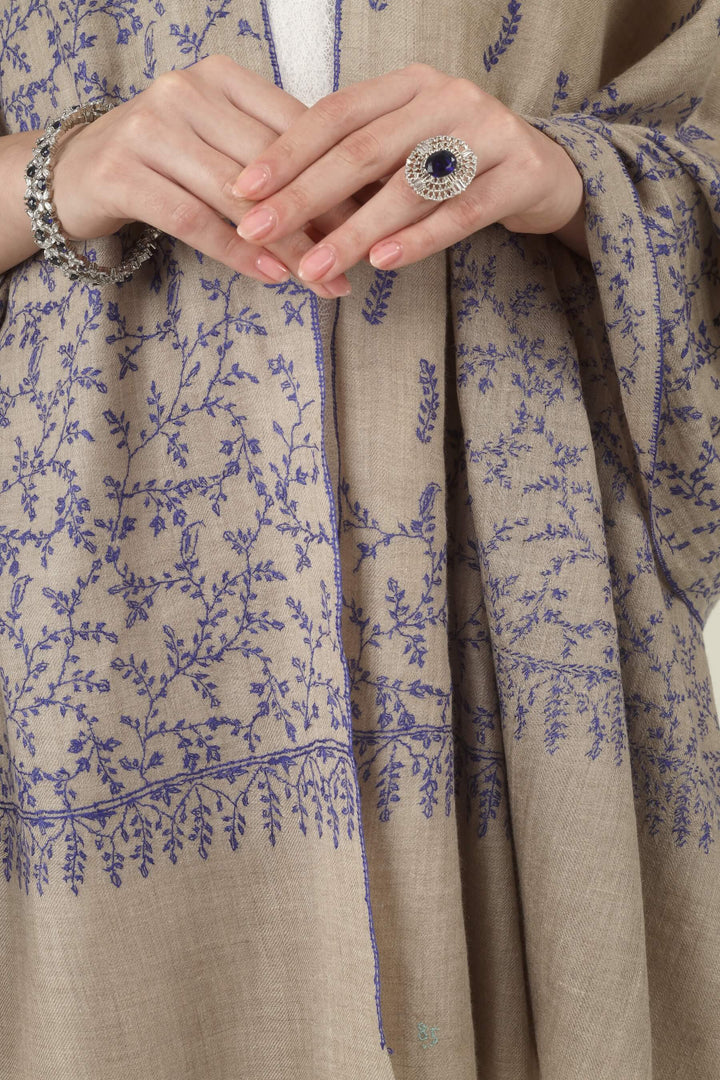 This Beige GI Kashmiri Pure Pashmina Blue Jaal Embroidered Stole features a soft natural beige base covered in fine royal blue floral vines. Delicate leaves, tiny buds and curling tendrils 
    
      | pashmina shawls online | authentic Kashmiri pashmina shawl online | pure pashmina shawl online | original GI certified pashmina shawl online | luxury men's pashmina shawl online from Kashmir | where to buy online pure pashmina in India
    
    | GI Tag Certified - Government-verified authentic Kashmiri Pashmina
    | G20 Official Partner - Selected by India for G20 Summit gifting
    | Handicraft Registered - Official recognition of traditional craftsmanship
    | Certificate of Authenticity - Every purchase includes GI certification