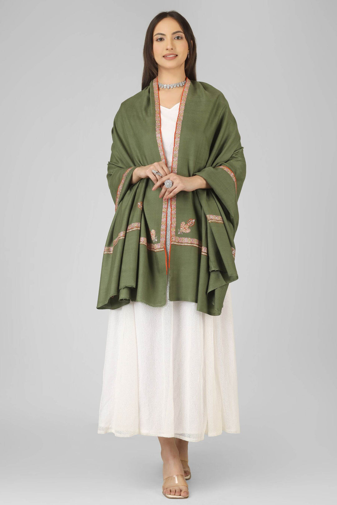 A beautiful choice for connoisseurs of pashmina shawls in the United Kingdom, this handwoven and finely embroidered piece brings authentic Kashmiri craftsmanship into a sophisticated, wearable staple.