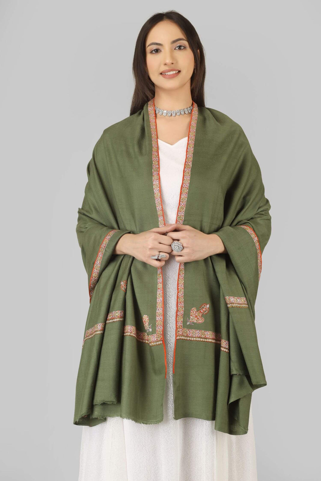 A beautiful choice for connoisseurs of pashmina shawls in the United Kingdom, this handwoven and finely embroidered piece brings authentic Kashmiri craftsmanship into a sophisticated, wearable staple.