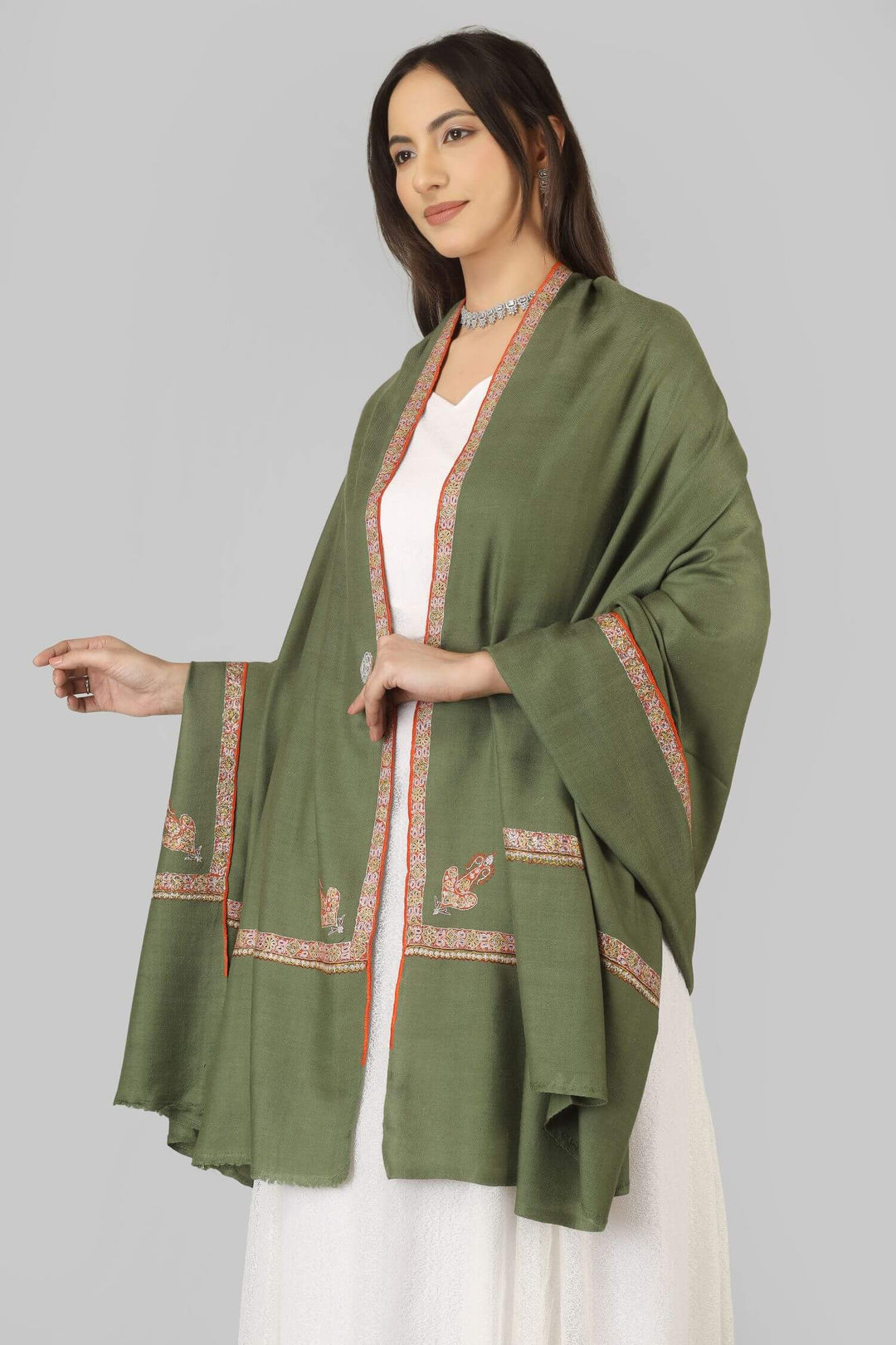 A beautiful choice for connoisseurs of pashmina shawls in the United Kingdom, this handwoven and finely embroidered piece brings authentic Kashmiri craftsmanship into a sophisticated, wearable staple.