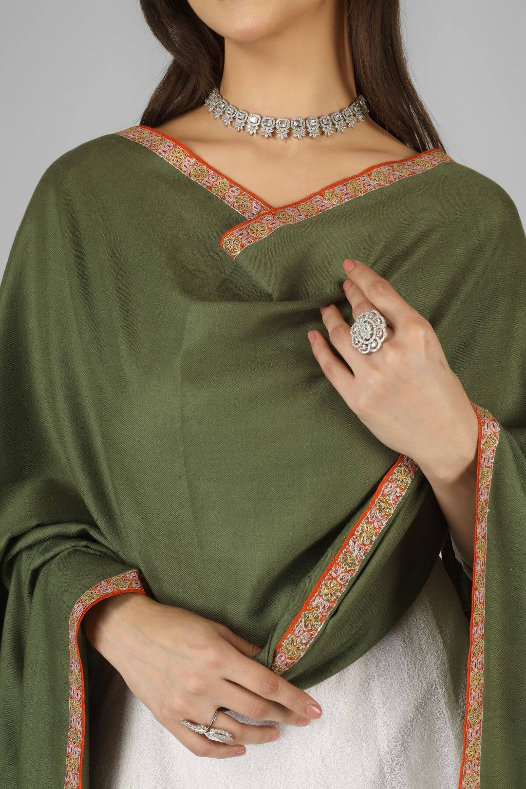A beautiful choice for connoisseurs of pashmina shawls in the United Kingdom, this handwoven and finely embroidered piece brings authentic Kashmiri craftsmanship into a sophisticated, wearable staple.