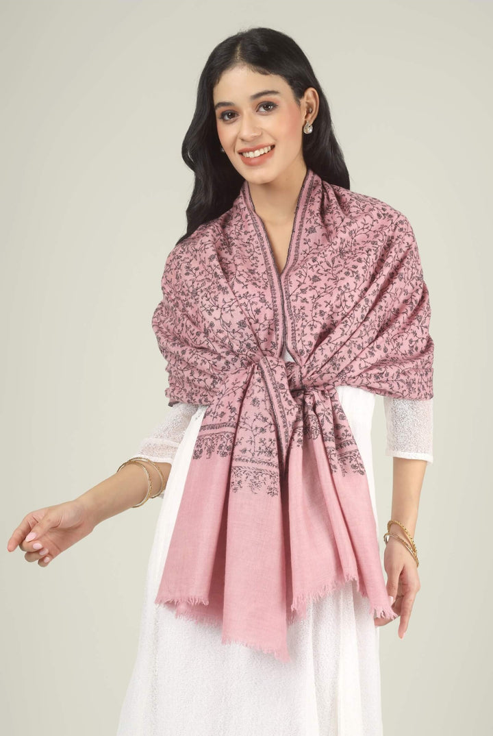 Model wearing a pink GI Kashmiri Pure Pashmina stole with all-over charcoal floral jaal Sozni embroidery over a white dress.
    
      | pashmina shawls online | authentic Kashmiri pashmina shawl online | pure pashmina shawl online | original GI certified pashmina shawl online | luxury men's pashmina shawl online from Kashmir | where to buy online pure pashmina in India
    
    | GI Tag Certified - Government-verified authentic Kashmiri Pashmina
    | G20 Official Partner - Selected by India for G20 Summit gifting
    | Handicraft Registered - Official recognition of traditional craftsmanship
    | Certificate of Authenticity - Every purchase includes GI certification