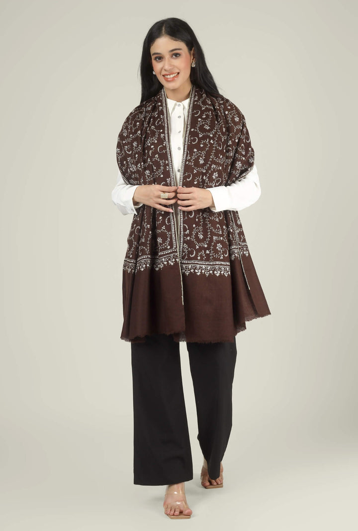 Close-up of a brown GI Kashmiri Pure Pashmina stole with ivory floral jaal and paisley Sozni embroidery worn open over a white shirt.
    
      | pashmina shawls online | authentic Kashmiri pashmina shawl online | pure pashmina shawl online | original GI certified pashmina shawl online | luxury men's pashmina shawl online from Kashmir | where to buy online pure pashmina in India
    
    | GI Tag Certified - Government-verified authentic Kashmiri Pashmina
    | G20 Official Partner - Selected by India for G20 Summit gifting
    | Handicraft Registered - Official recognition of traditional craftsmanship
    | Certificate of Authenticity - Every purchase includes GI certification