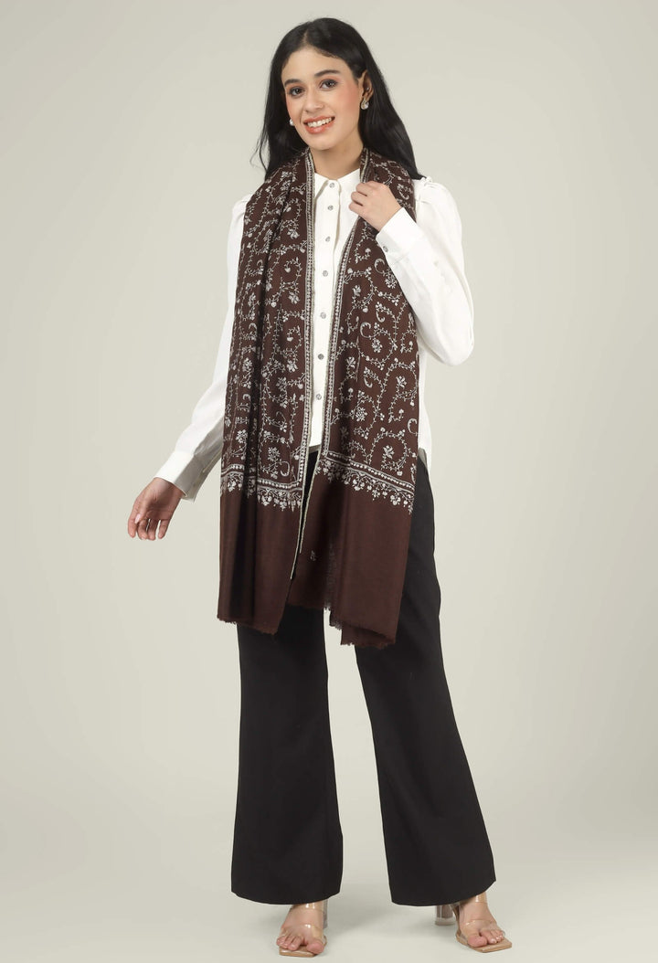 Close-up of a brown GI Kashmiri Pure Pashmina stole with ivory floral jaal and paisley Sozni embroidery worn open over a white shirt.
    
      | pashmina shawls online | authentic Kashmiri pashmina shawl online | pure pashmina shawl online | original GI certified pashmina shawl online | luxury men's pashmina shawl online from Kashmir | where to buy online pure pashmina in India
    
    | GI Tag Certified - Government-verified authentic Kashmiri Pashmina
    | G20 Official Partner - Selected by India for G20 Summit gifting
    | Handicraft Registered - Official recognition of traditional craftsmanship
    | Certificate of Authenticity - Every purchase includes GI certification