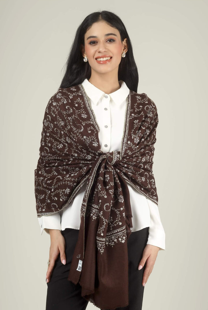 Close-up of a brown GI Kashmiri Pure Pashmina stole with ivory floral jaal and paisley Sozni embroidery worn open over a white shirt.
    
      | pashmina shawls online | authentic Kashmiri pashmina shawl online | pure pashmina shawl online | original GI certified pashmina shawl online | luxury men's pashmina shawl online from Kashmir | where to buy online pure pashmina in India
    
    | GI Tag Certified - Government-verified authentic Kashmiri Pashmina
    | G20 Official Partner - Selected by India for G20 Summit gifting
    | Handicraft Registered - Official recognition of traditional craftsmanship
    | Certificate of Authenticity - Every purchase includes GI certification