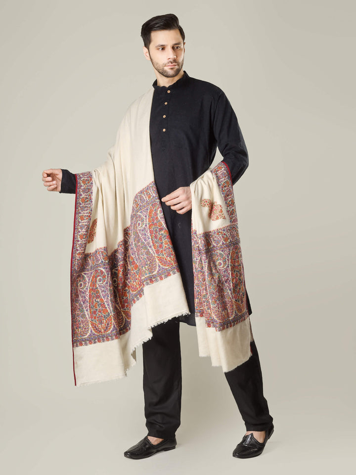 Antique Kashmiri kalamkari sozni men’s shawl with intricate multicolour paisley and floral embroidery on ivory pashmina, draped over a black kurta, handcrafted luxury wedding shawl from Kashmir.
    
      | pashmina shawls online | authentic Kashmiri pashmina shawl online | pure pashmina shawl online | original GI certified pashmina shawl online | luxury men's pashmina shawl online from Kashmir | where to buy online pure pashmina in India
    
    | GI Tag Certified - Government-verified authentic Kashmiri Pashmina
    | G20 Official Partner - Selected by India for G20 Summit gifting
    | Handicraft Registered - Official recognition of traditional craftsmanship
    | Certificate of Authenticity - Every purchase includes GI certification