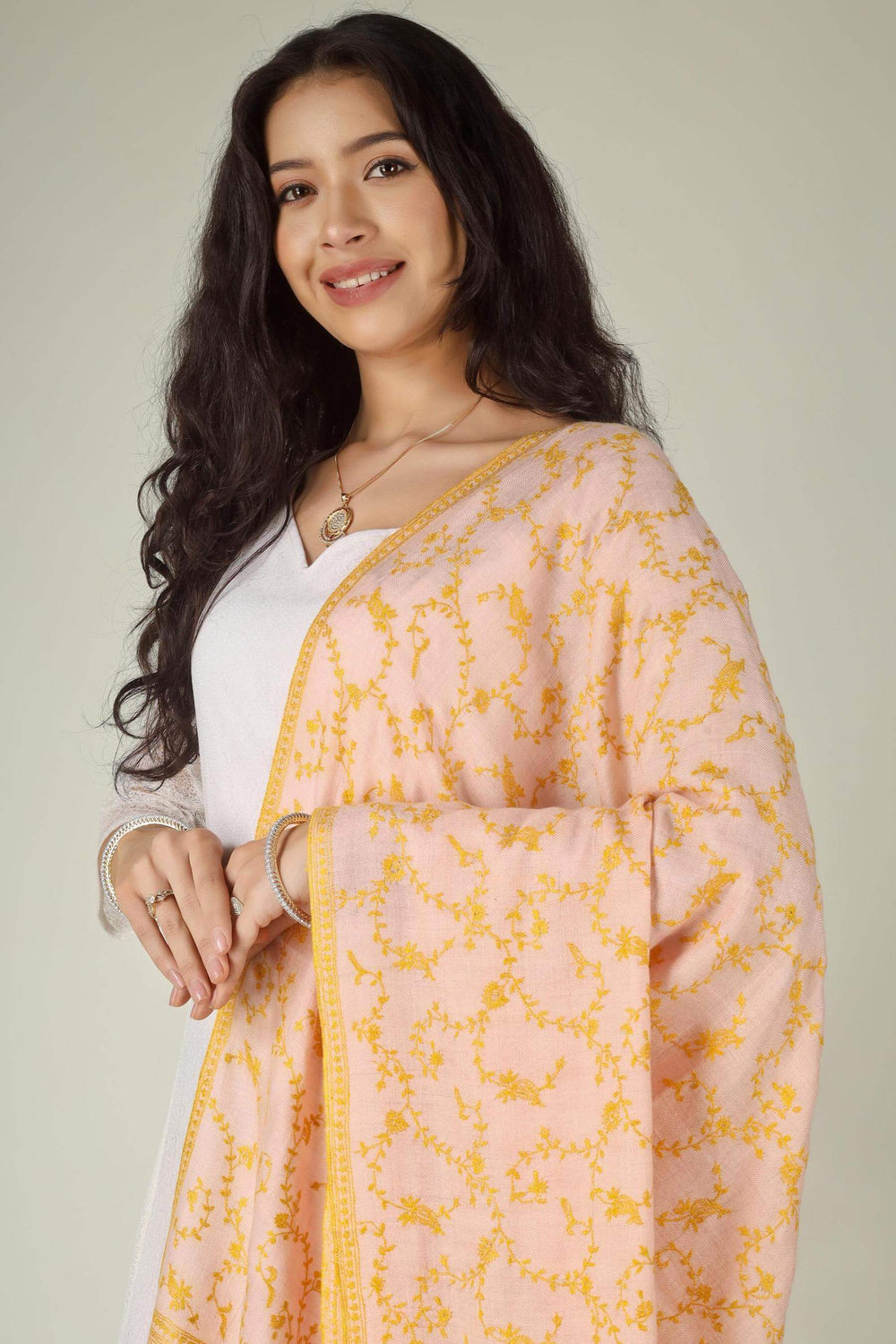  pastel pashmina shawls with golden embroidery online, this jaldaar piece blends traditional Kashmiri artistry with modern occasion wear style.