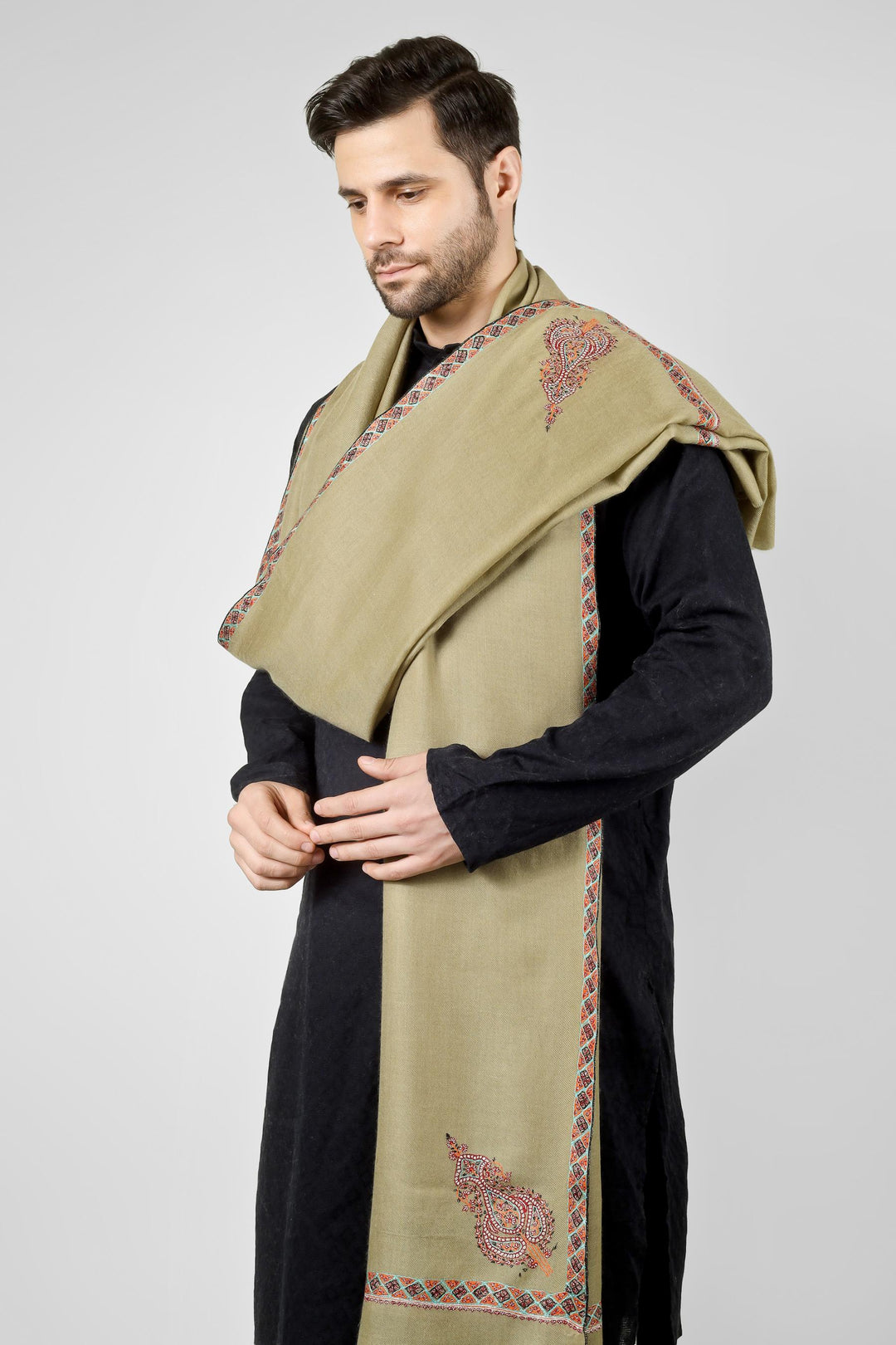 Ideal for gentlemen worldwide seeking luxury men's pashmina shawls in the USA, Canada, UK, Europe and Middle East, this olive green paisley delivers authentic Kashmiri craftsmanship for distinctive style
