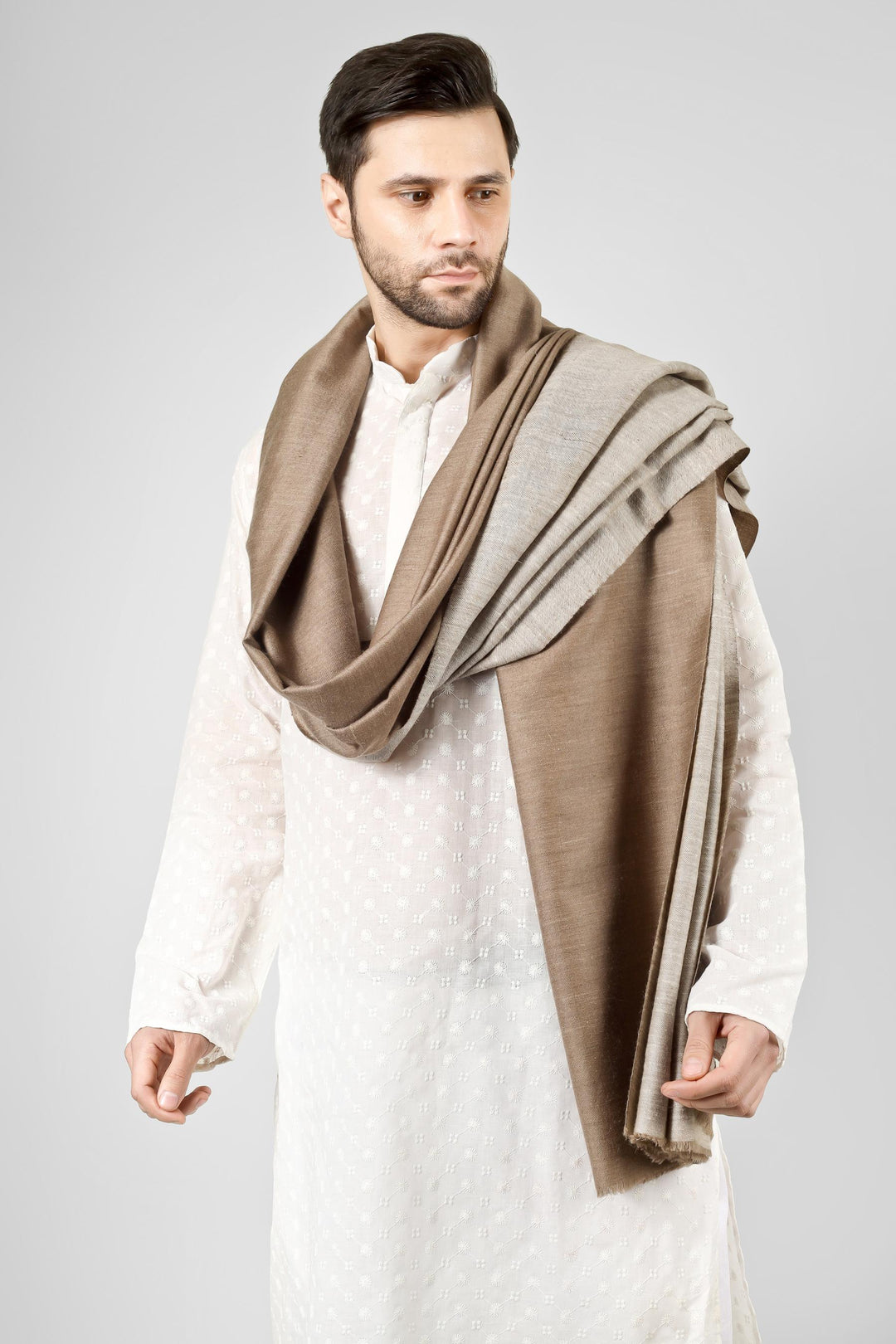 Ideal for gentlemen worldwide seeking luxury men's pashmina shawls in the USA, Canada, UK, Europe and Middle East, this reversible natural pashmina shawl delivers authentic Kashmiri quality for versatile elegance