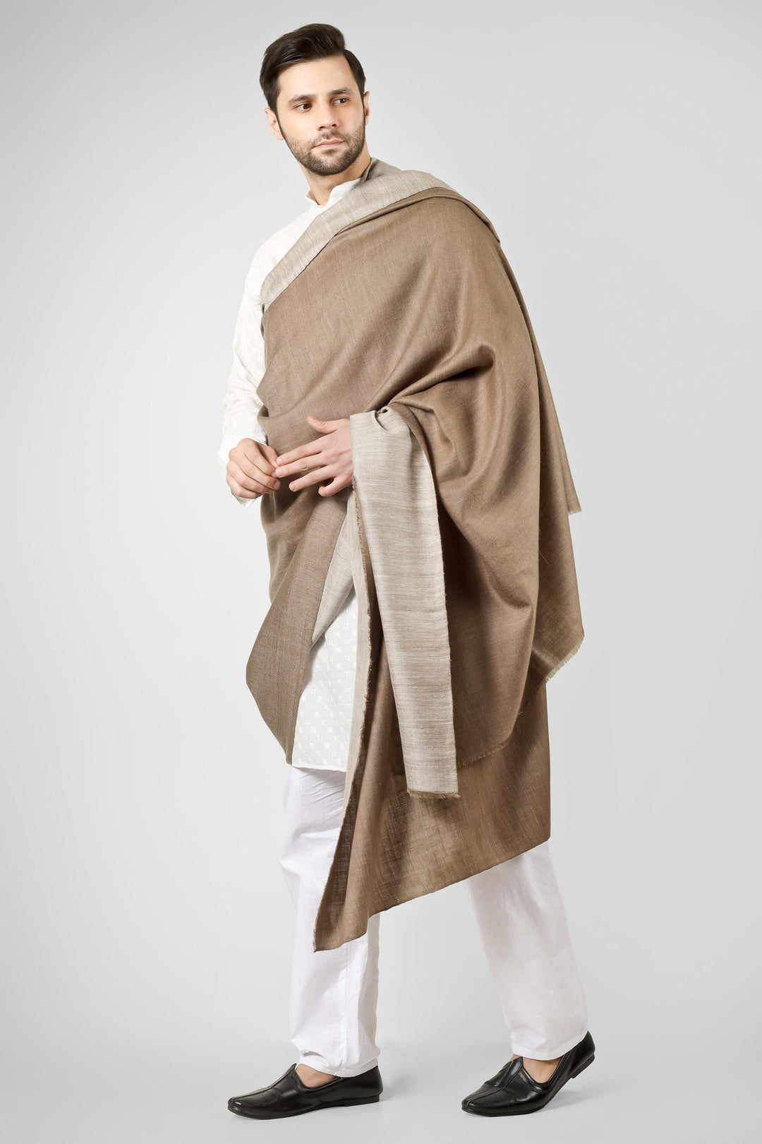 Ideal for gentlemen worldwide seeking luxury men's pashmina shawls in the USA, Canada, UK, Europe and Middle East, this reversible natural pashmina shawl delivers authentic Kashmiri quality for versatile elegance