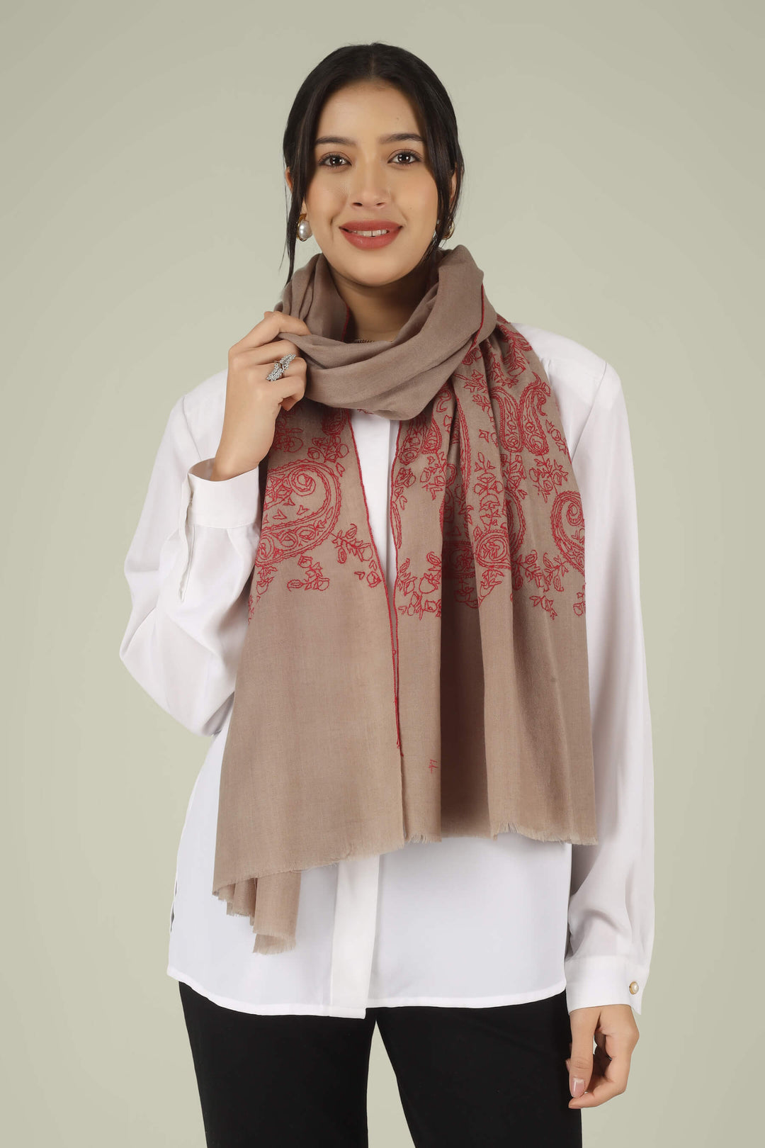 Hand-embroidered natural taupe pure Pashmina stole featuring oversized crimson-red Sozni paisley (Buta) motifs on the end panels from Kepra.