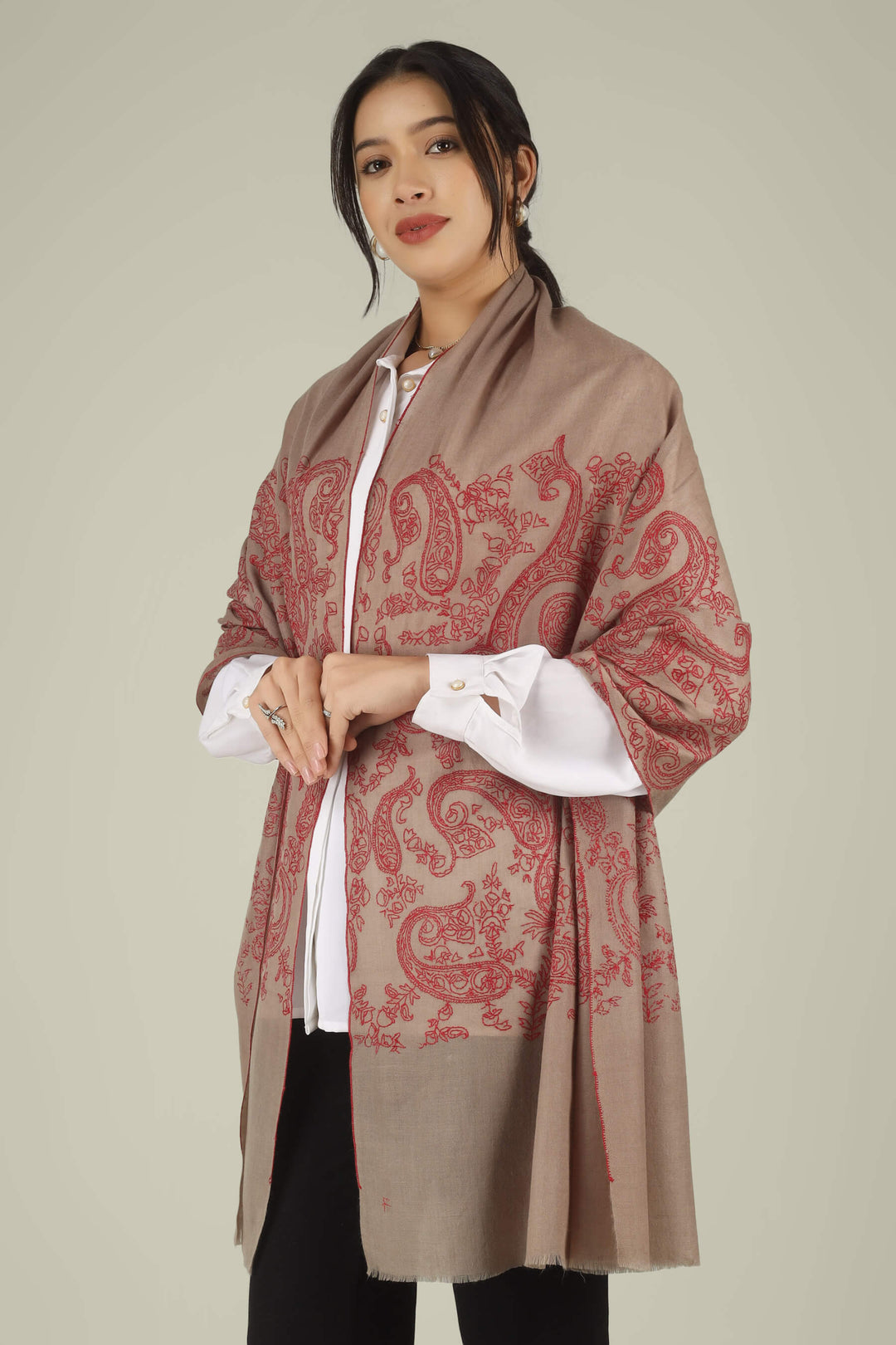 Hand-embroidered natural taupe pure Pashmina stole featuring oversized crimson-red Sozni paisley (Buta) motifs on the end panels from Kepra.