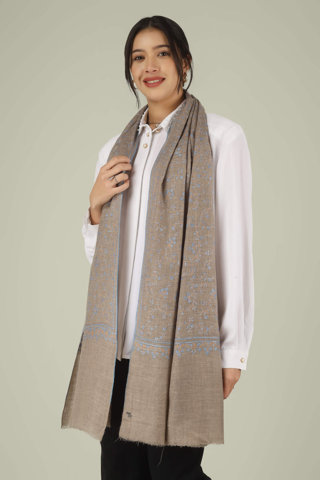 Hand-embroidered natural taupe pure Pashmina stole featuring an all-over sky-blue Sozni Jaldaar floral vine pattern from Kepra.